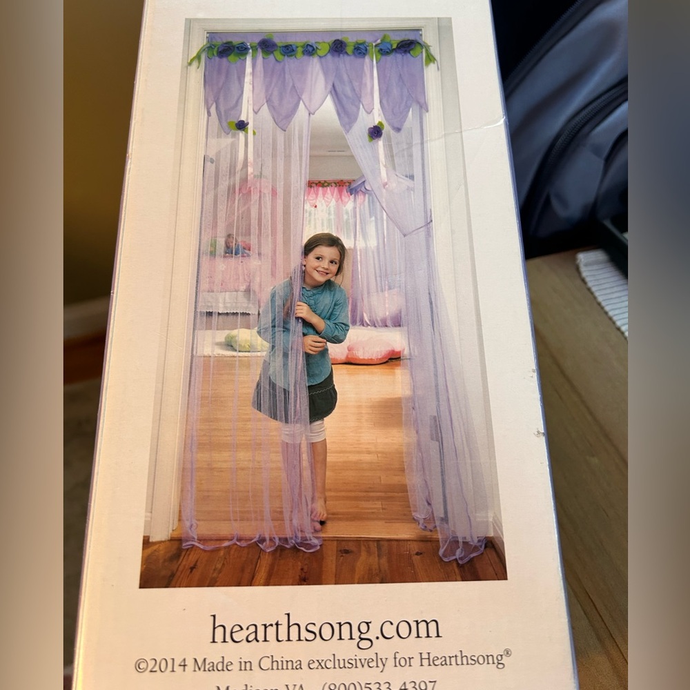 HearthSong Purple Flower Petals drape your doorway with blooming valance